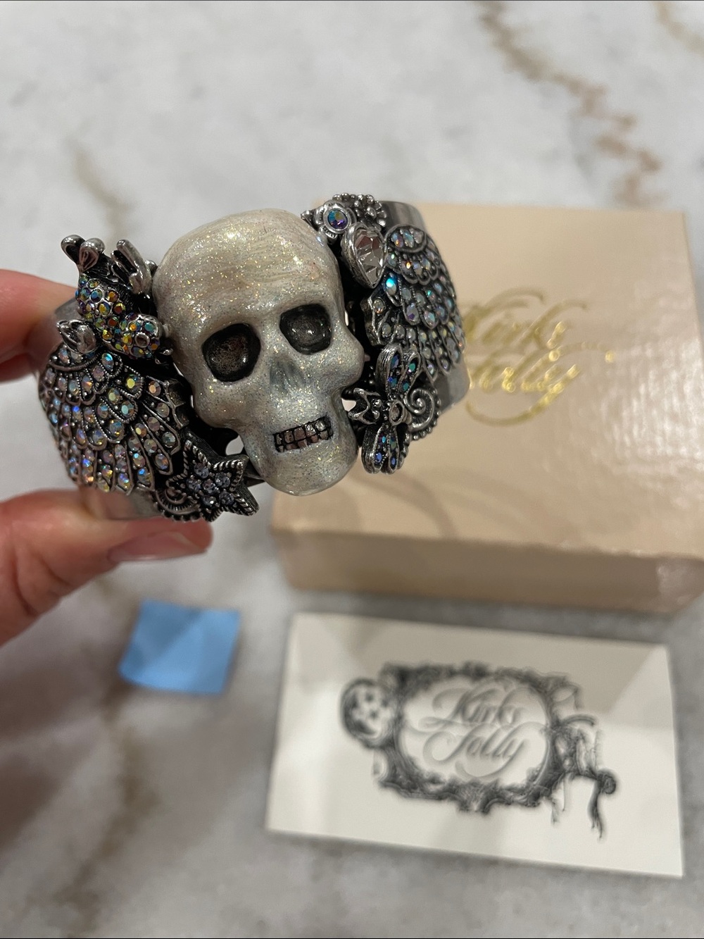 Kirks Folly Silver Glitter Skull Cuff with Iridescent Crystal Wings